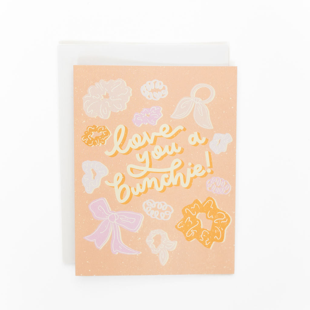 greeting card with scrunchie illustrations that says "love you a bunchie" hand designed by fraser valley artist